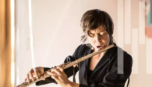 Claire Chase playing the flute