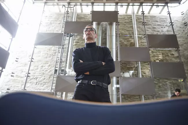 a person standing and looking forward